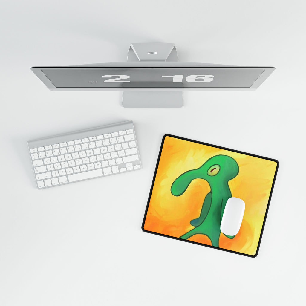Brash Green Blob Character Desk Mat | Abstract Orange Background
